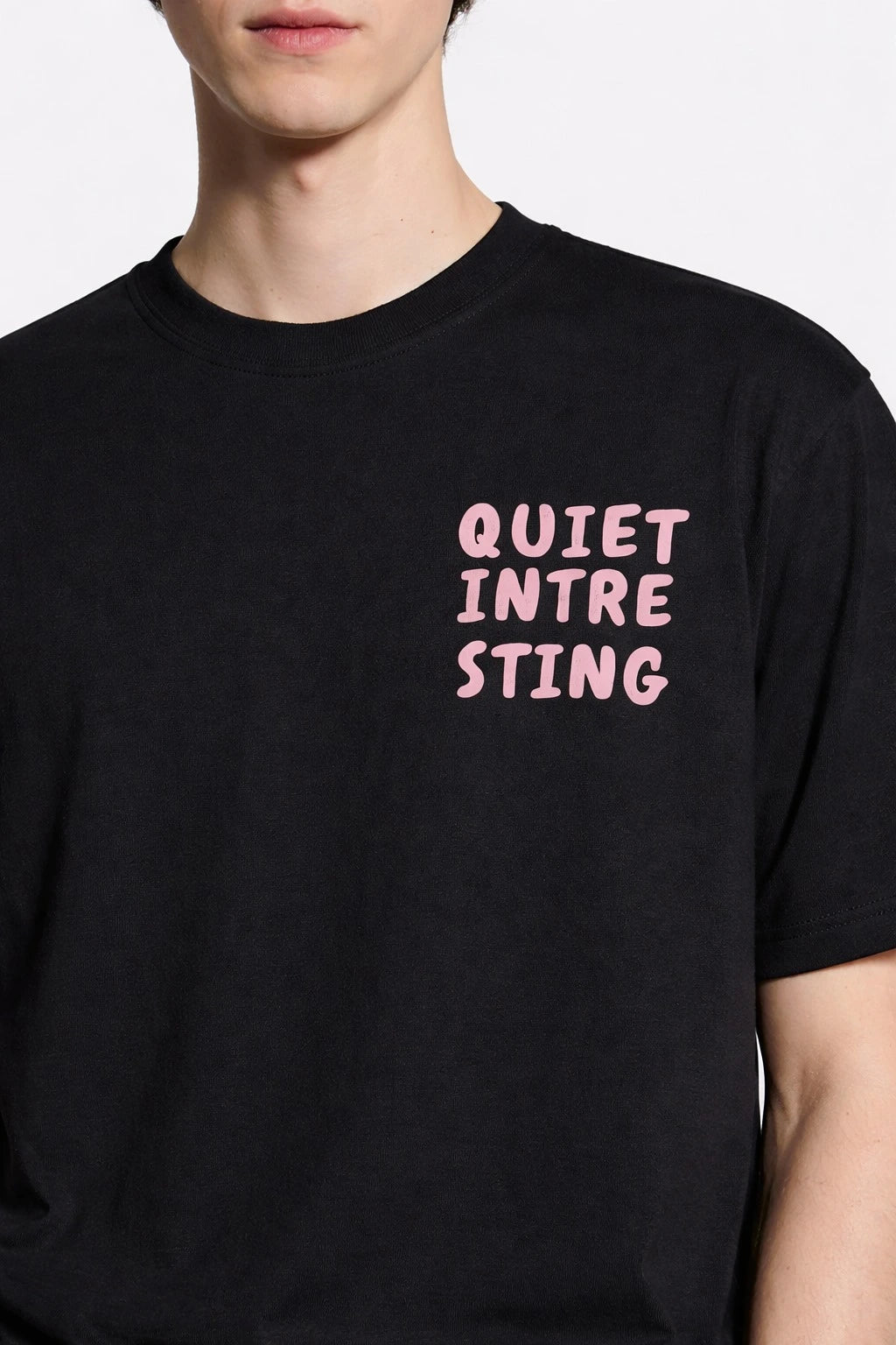 black tshirt quiet intersting close up look front