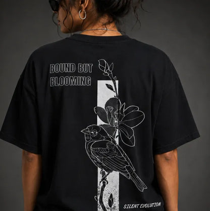 black tshirt bird floral design closeup look